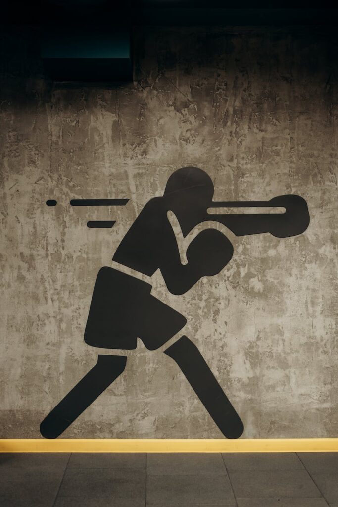 painting of a boxer on wall